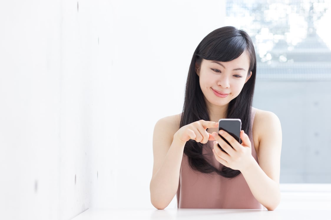 Japanese woman using a smartphone